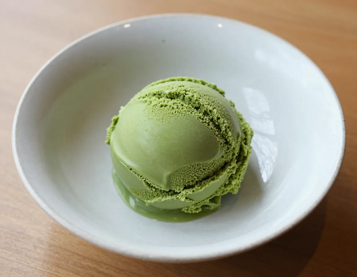 Creamy matcha ice cream scoop traditional japanese ceramic dish