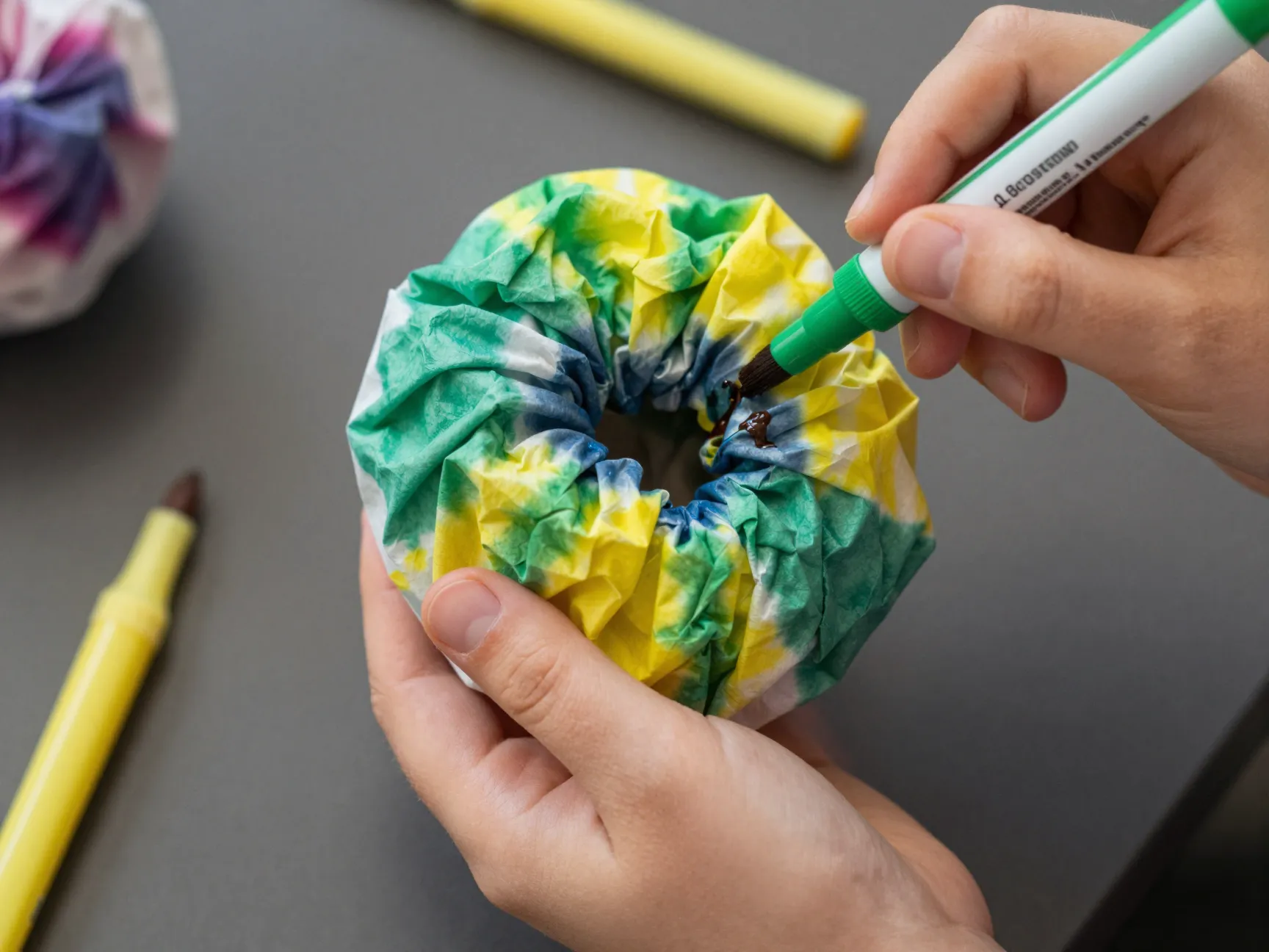 Tie dye coffee filter scrunched bunch colored sections green yellow pattern