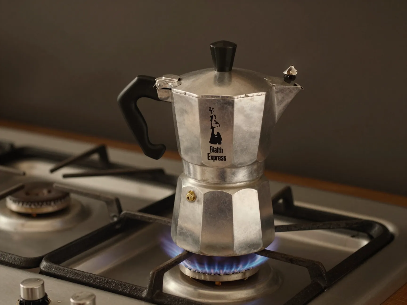 Bialetti moka express classic octagonal aluminum moka pot on gas stove