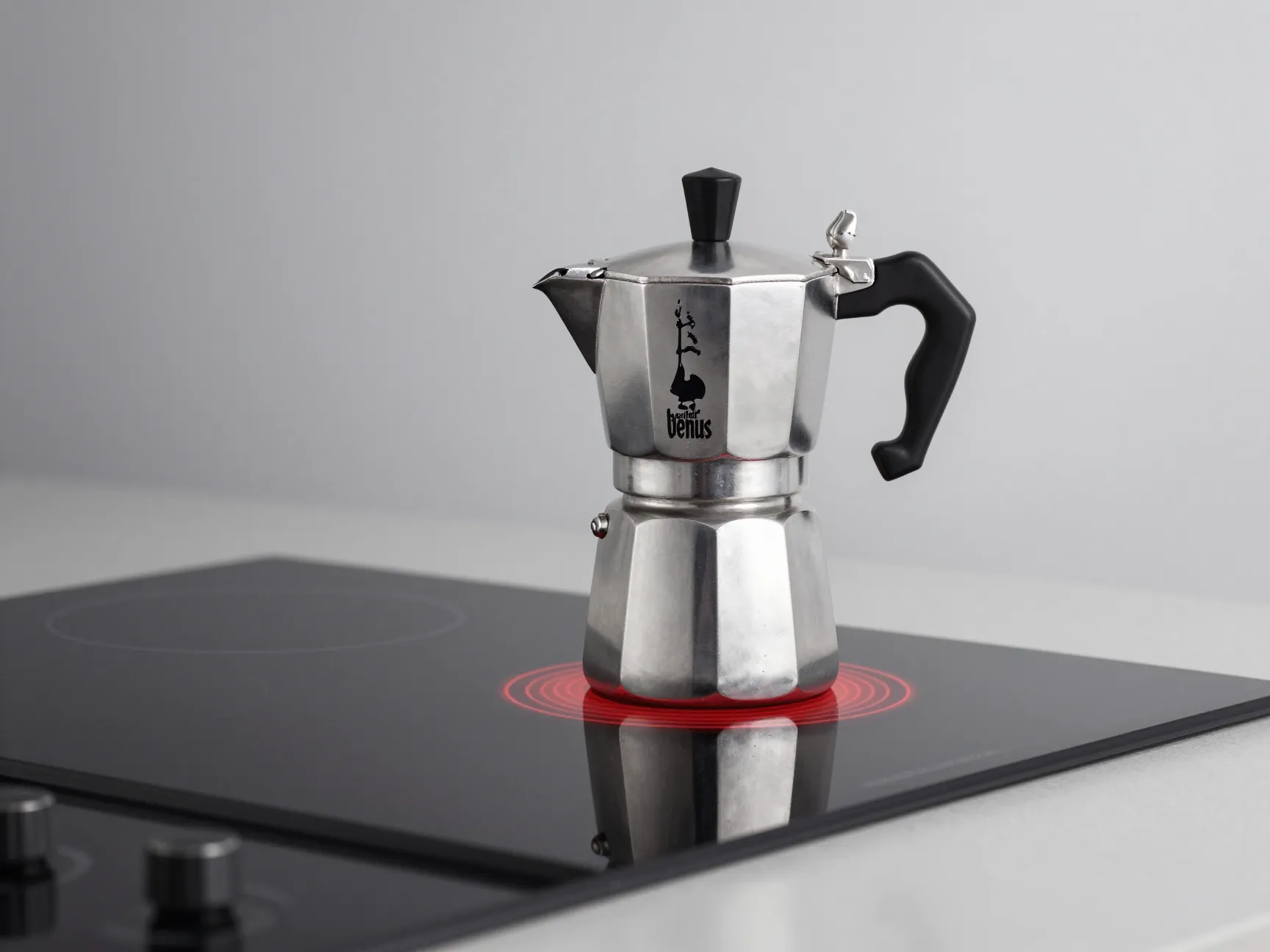 Bialetti venus induction compatible stainless steel moka pot on glass cooktop