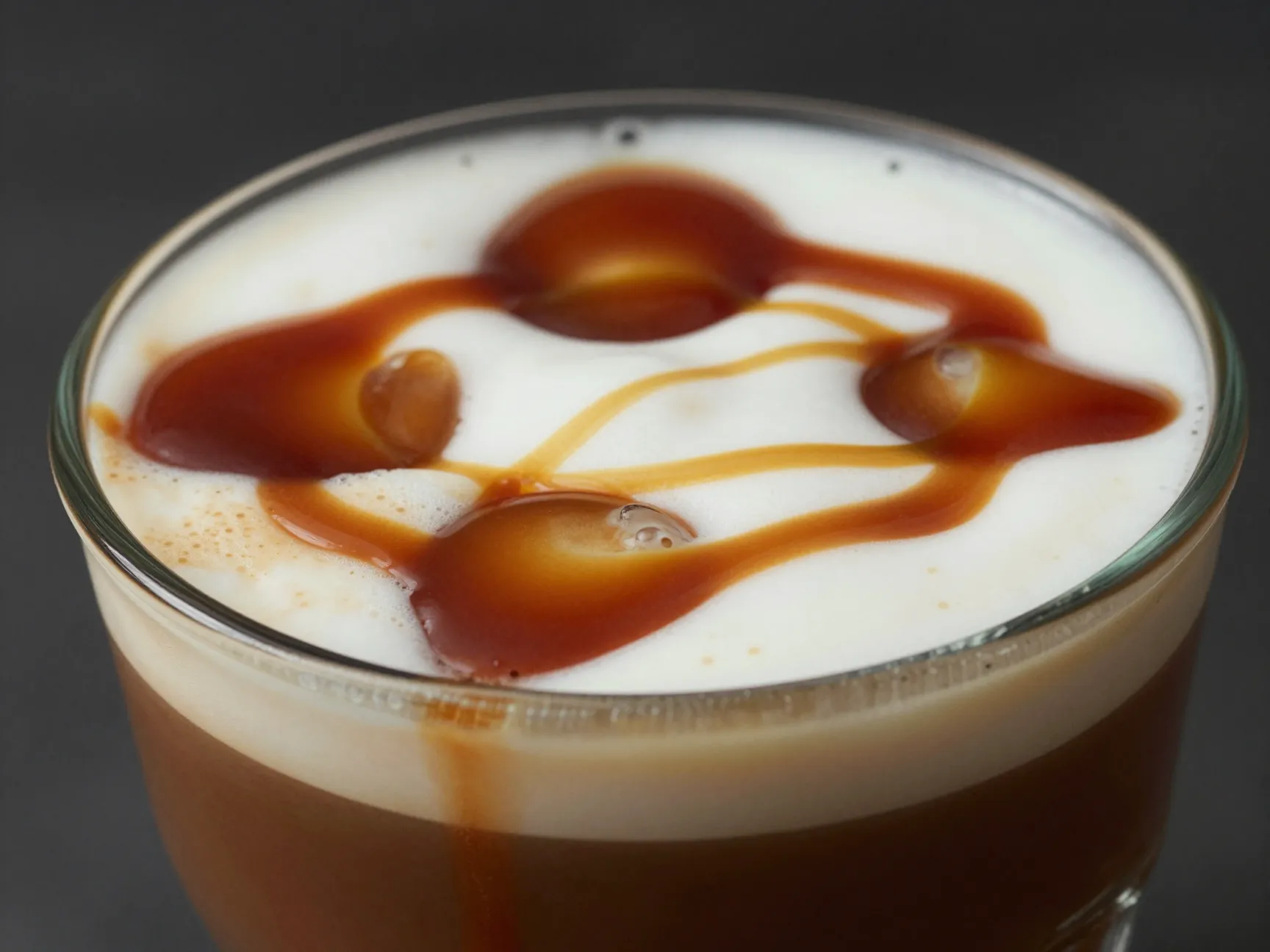 Extra shot caramel macchiato with three espresso shots in a grande cup