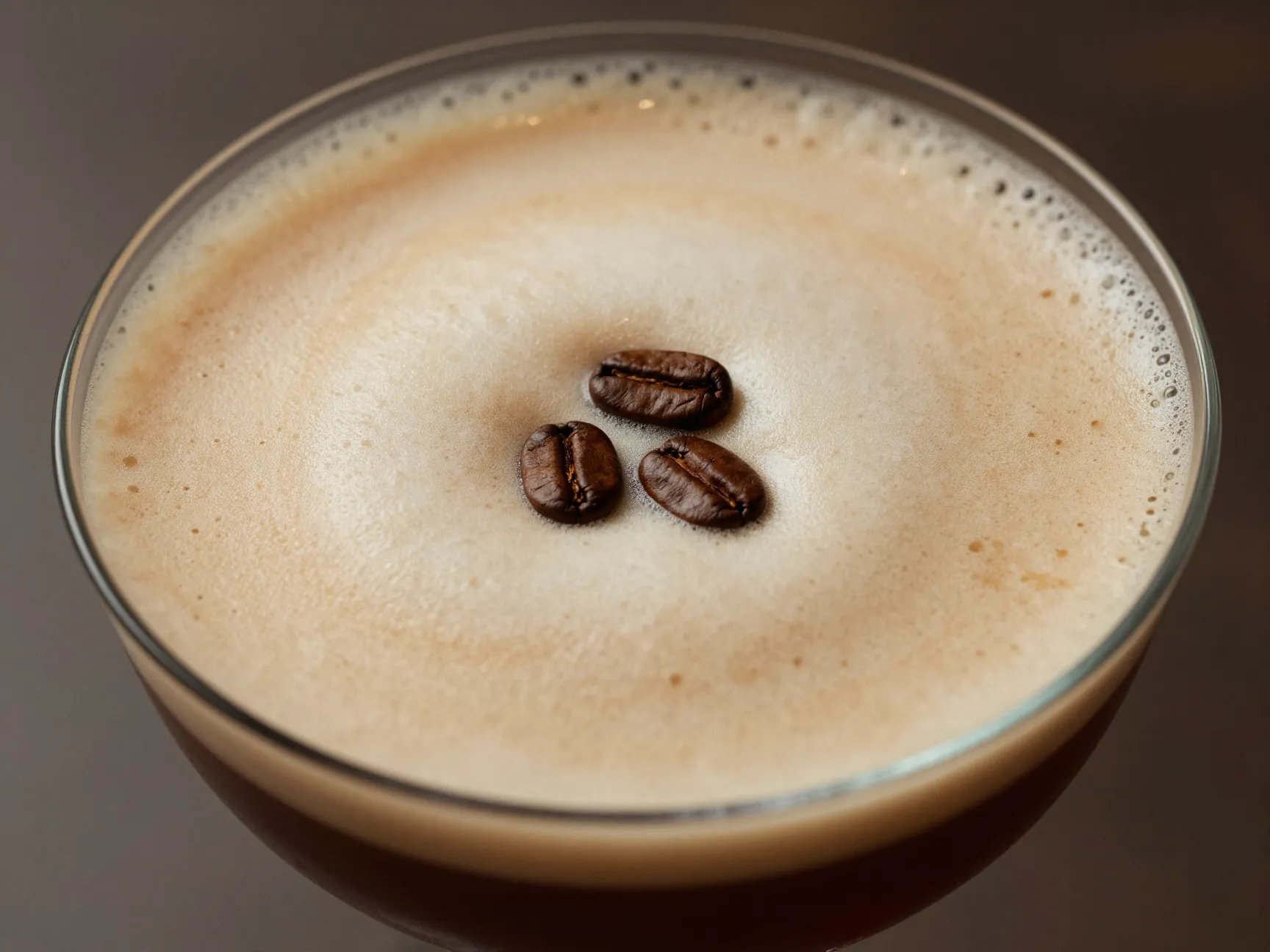 Three beans spiced espresso martini with thick foam raft