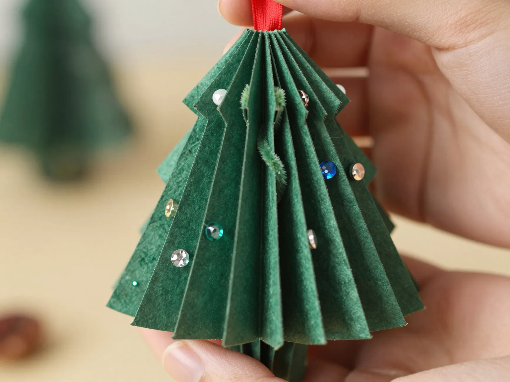 Accordion folded green dyed coffee filter christmas tree ornament