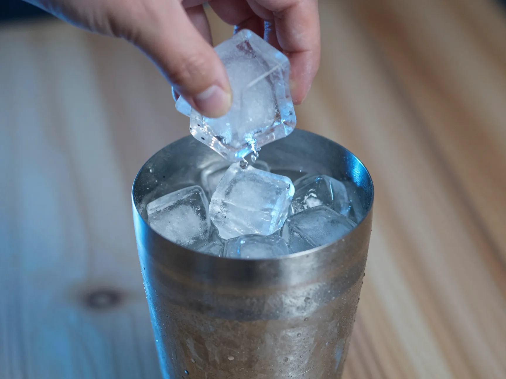 Generous handful of fresh ice cubes in cocktail shaker