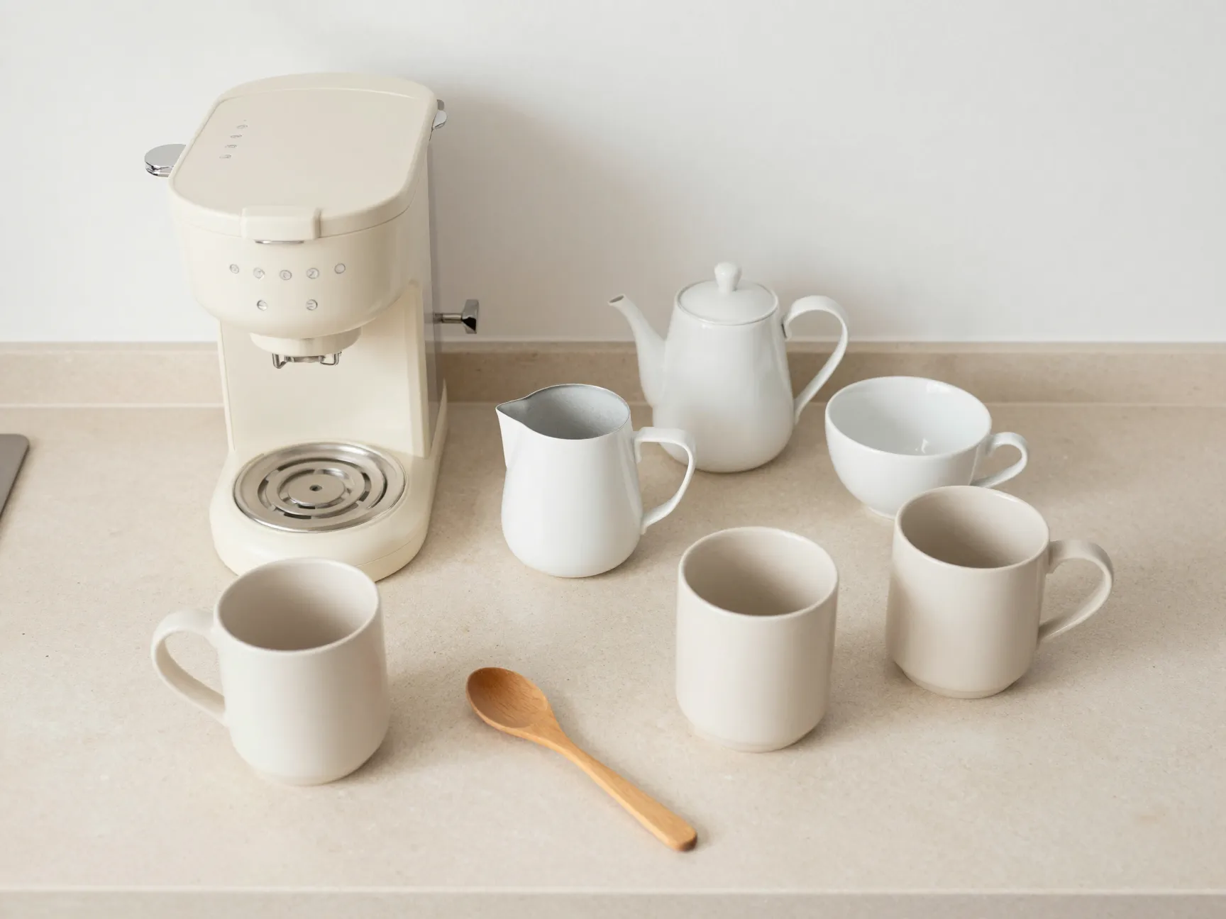 Monochrome cream white coffee maker mugs styled flatlay
