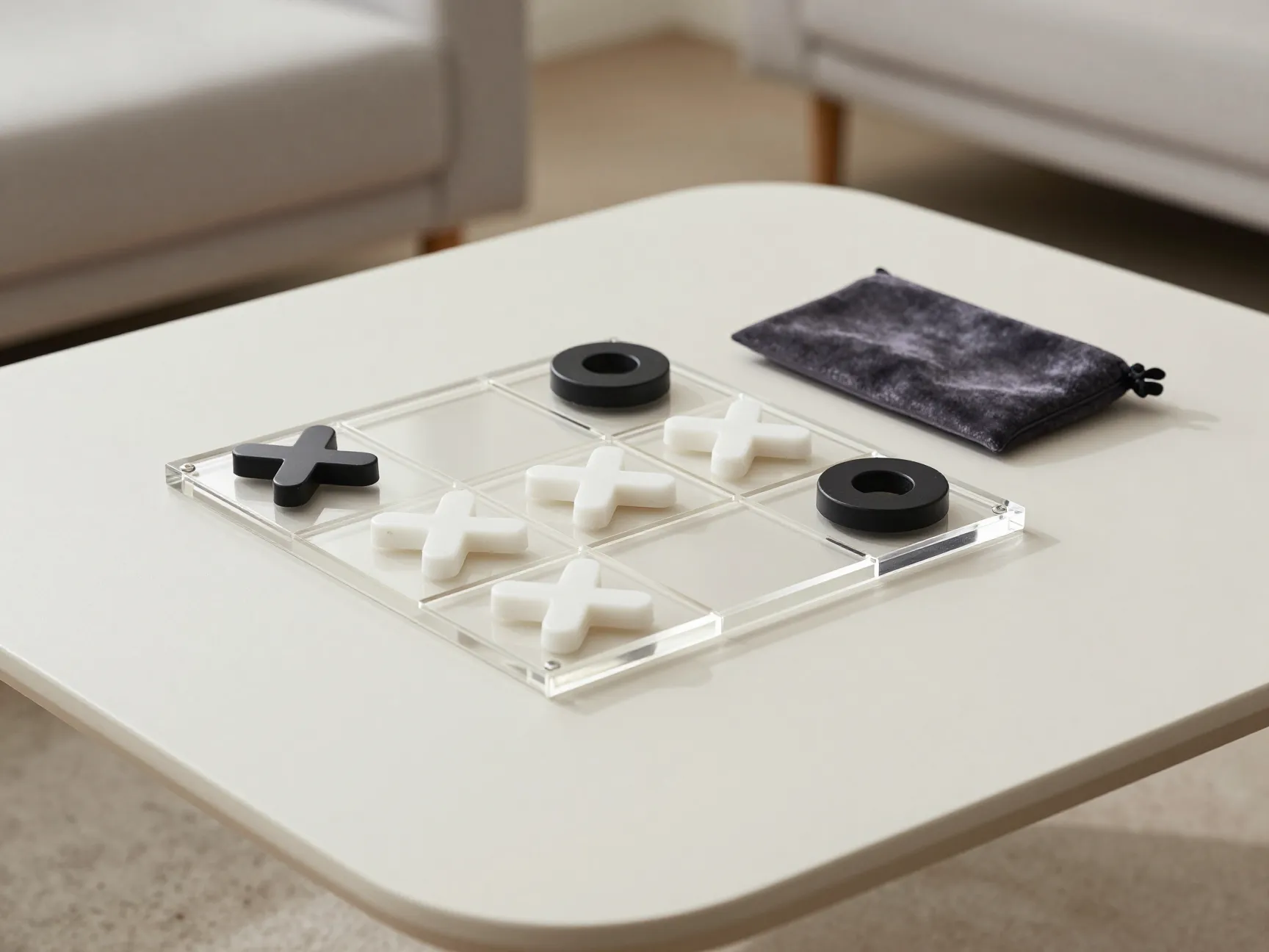 Modern acrylic tictactoe set on a minimalist living room table