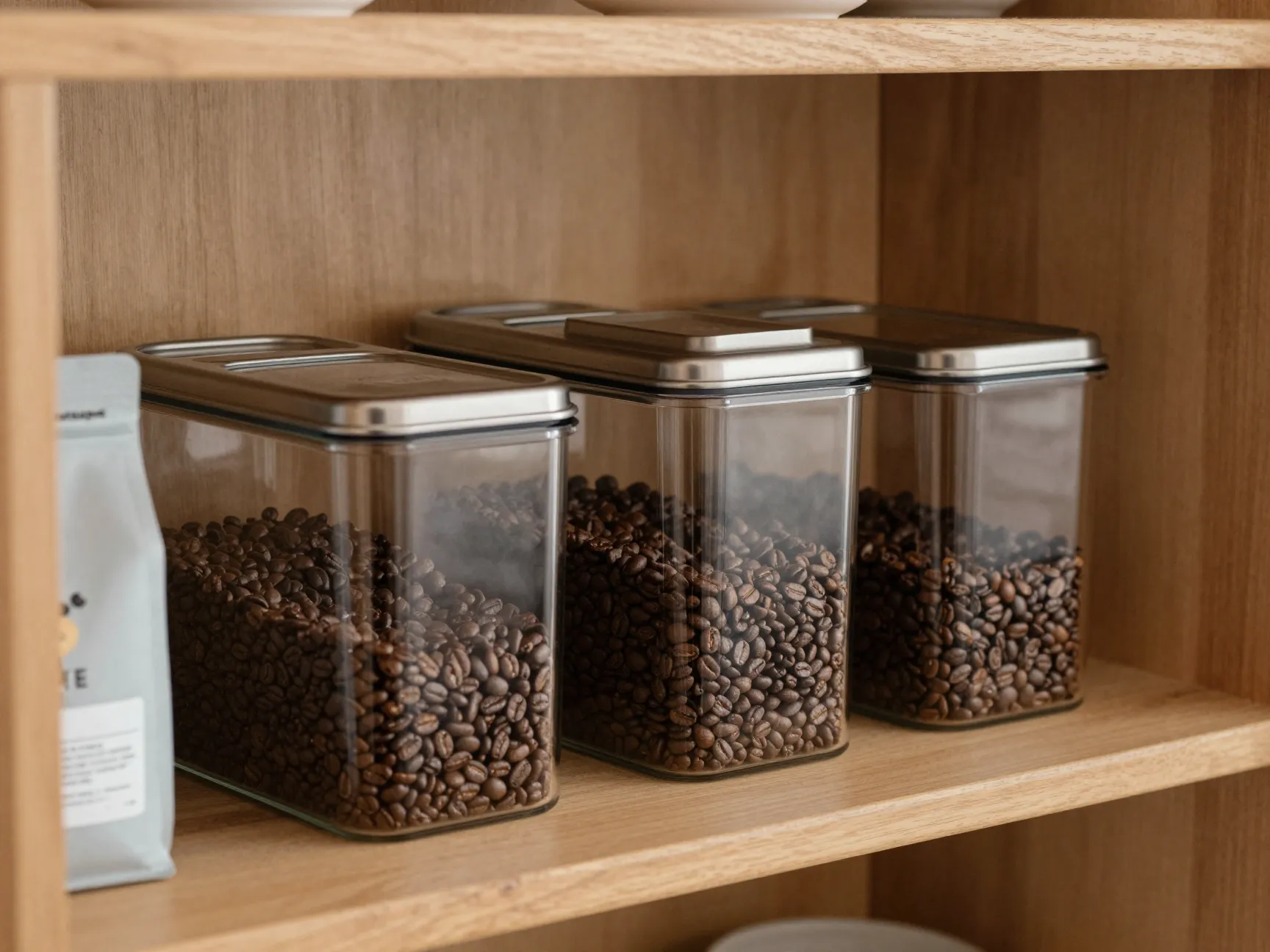 Airscape coffee container on wooden shelf with beans