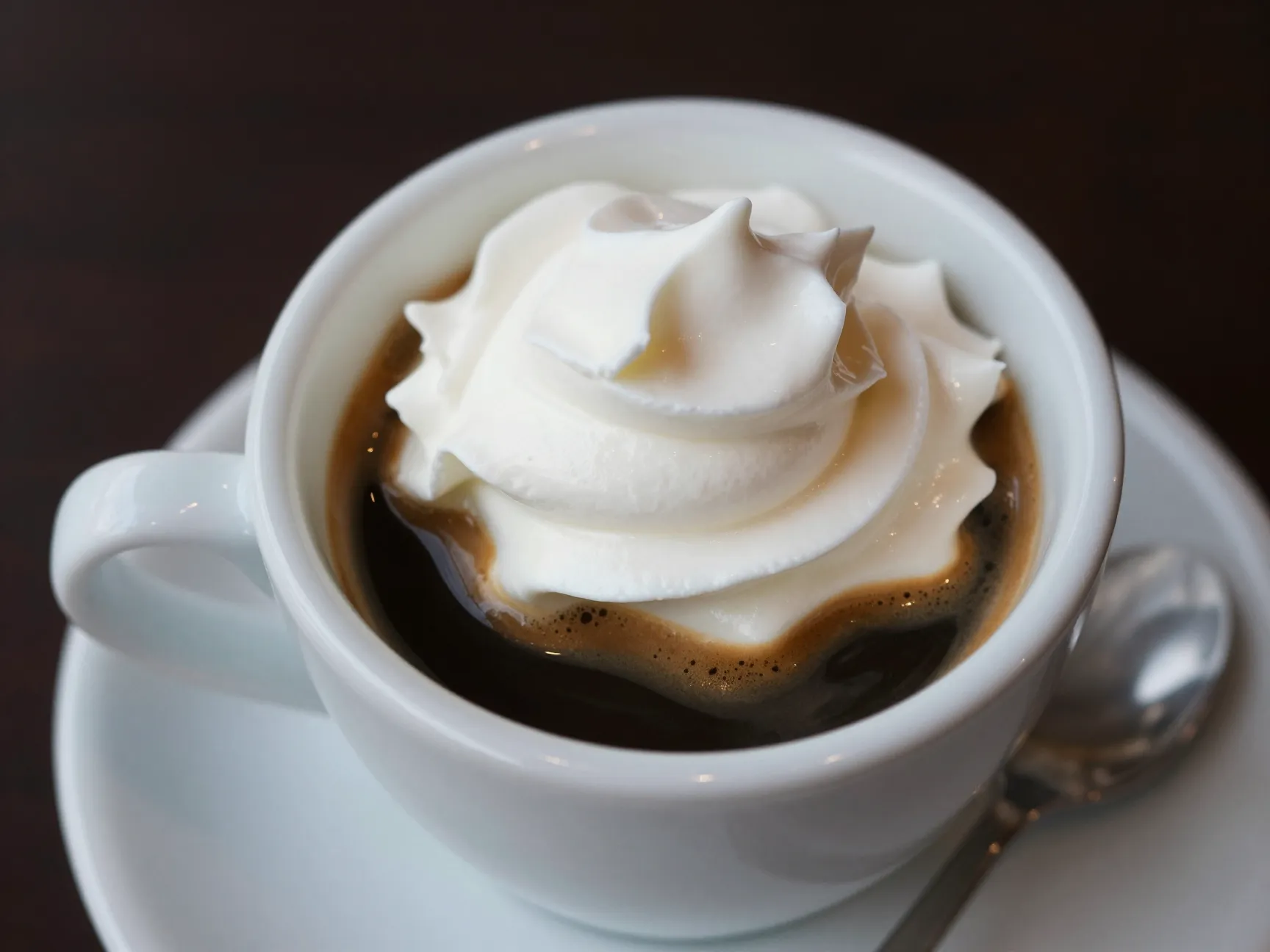 Espresso con panna with dollop of fresh whipped cream