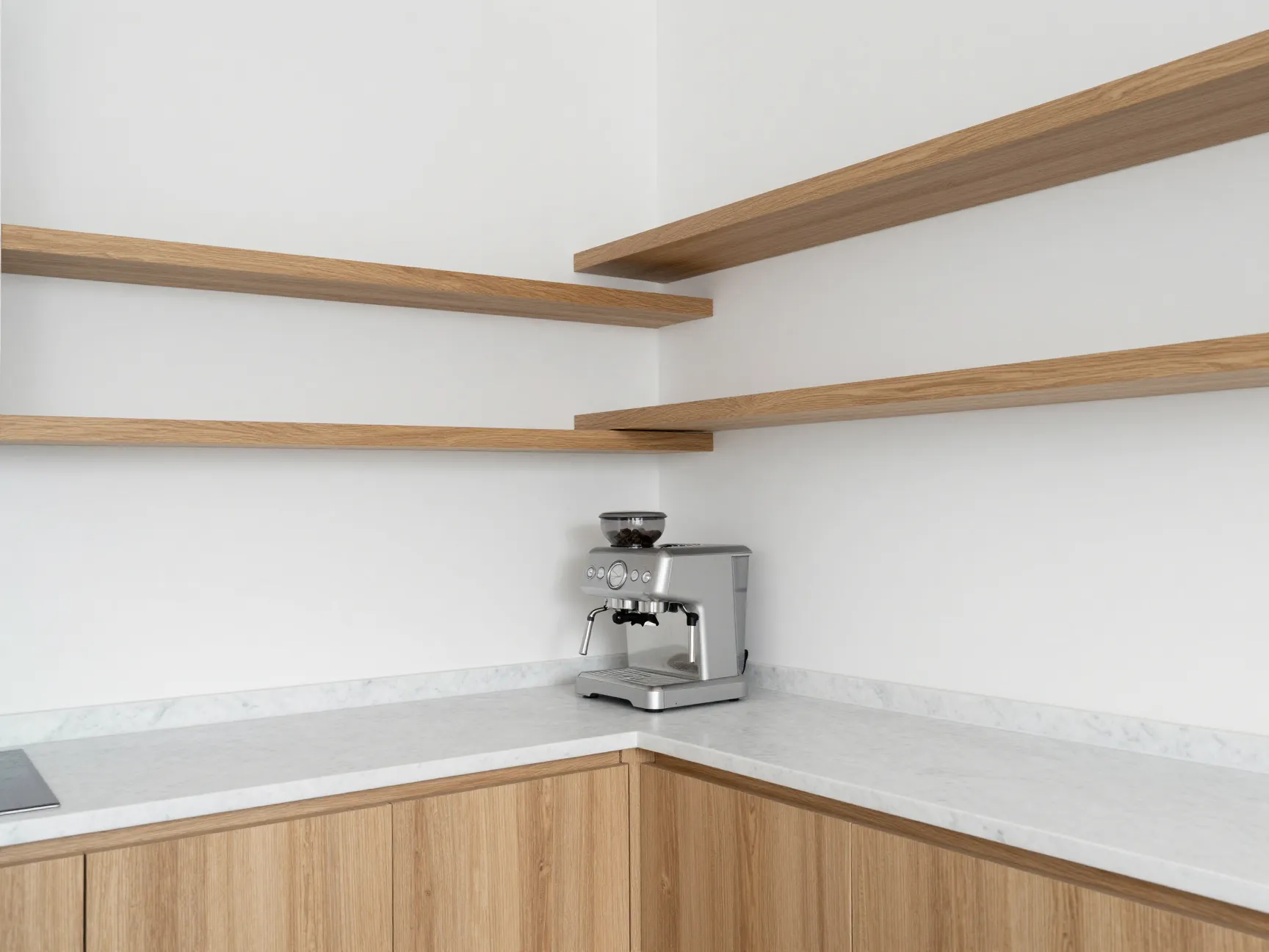 Raw wood shelves white walls and marble countertop in minimalist style