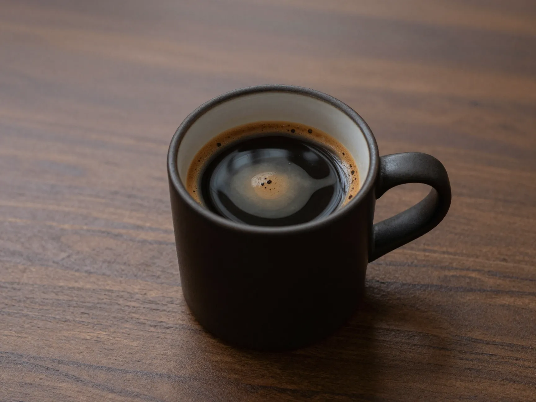 Black eye double espresso shots in dark roast mug