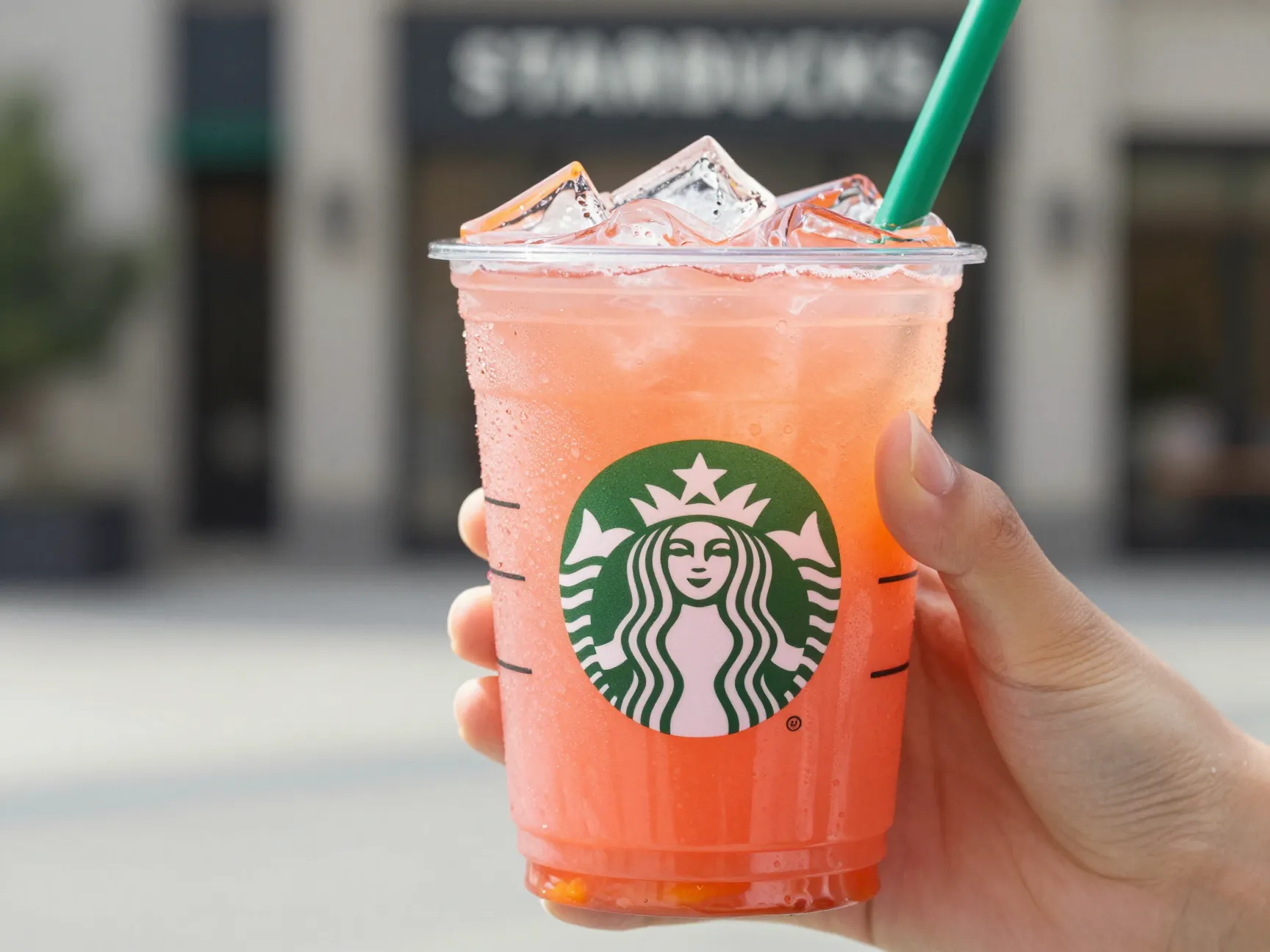 Starbucks mango strawberry energy refresher in plastic cup