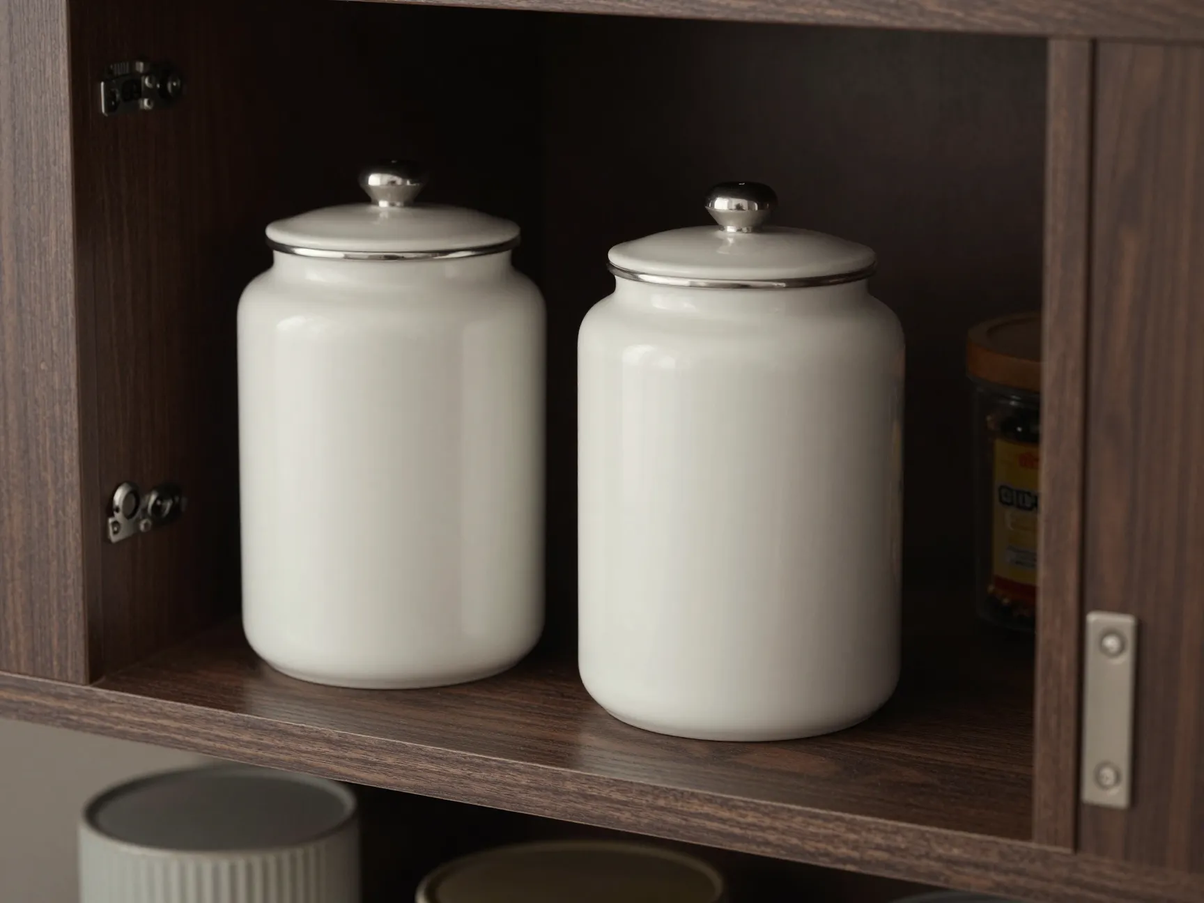 Airtight coffee canister with one way valve stored in dark cabinet