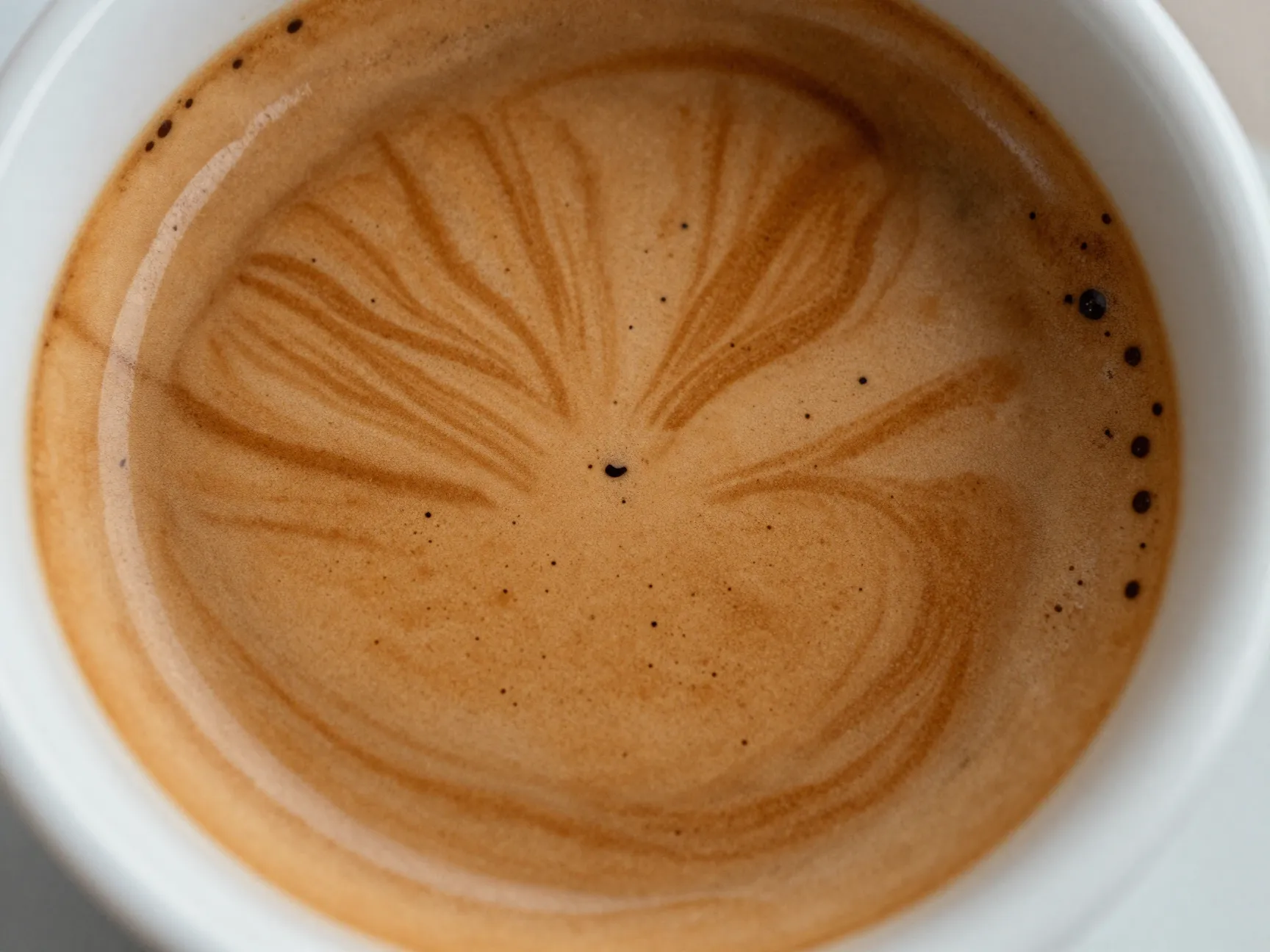 Perfect hazelnut brown tiger striped crema on top of fresh espresso