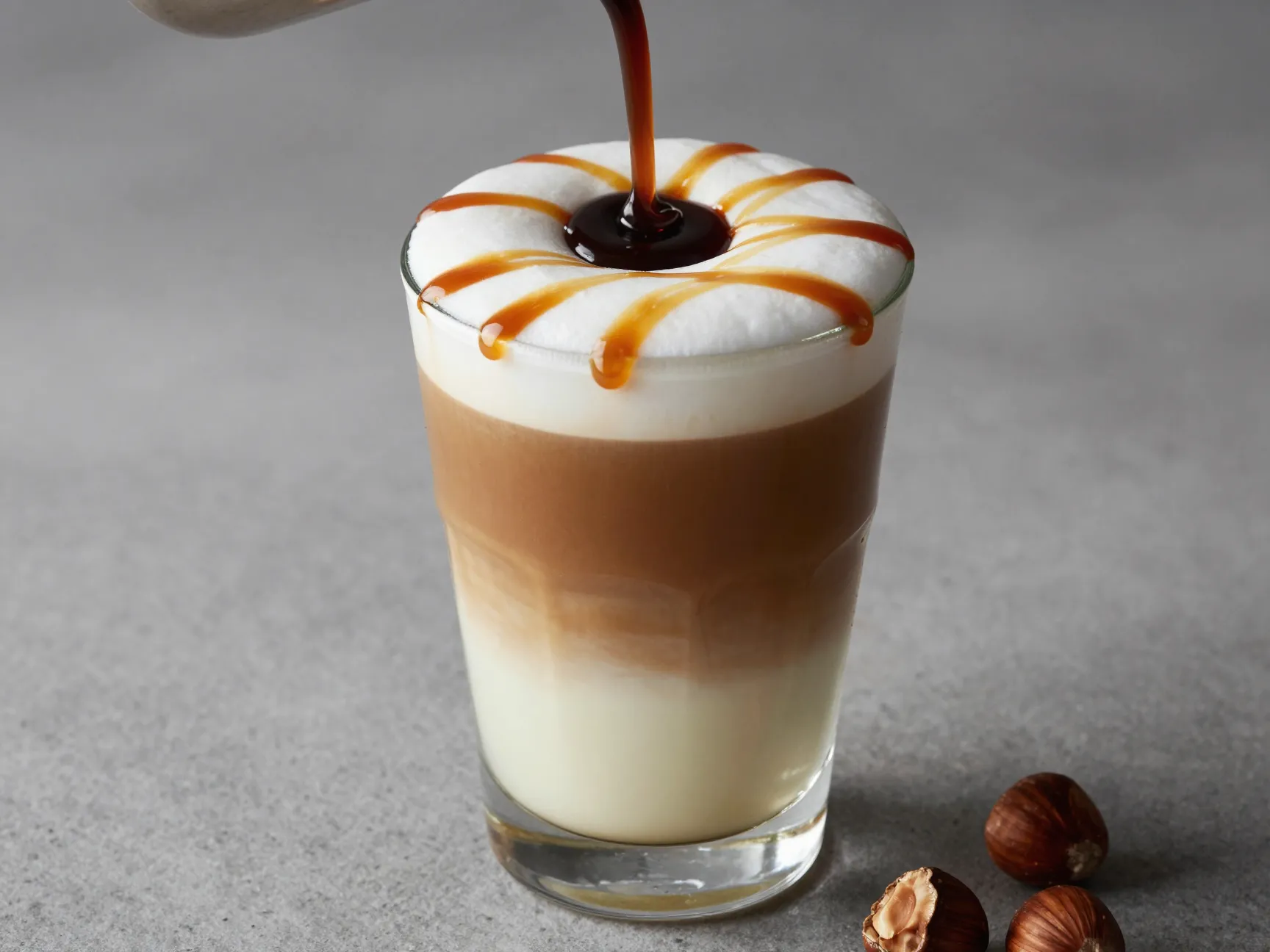 Caramel hazelnut mocha macchiato with extra drizzle and mocha