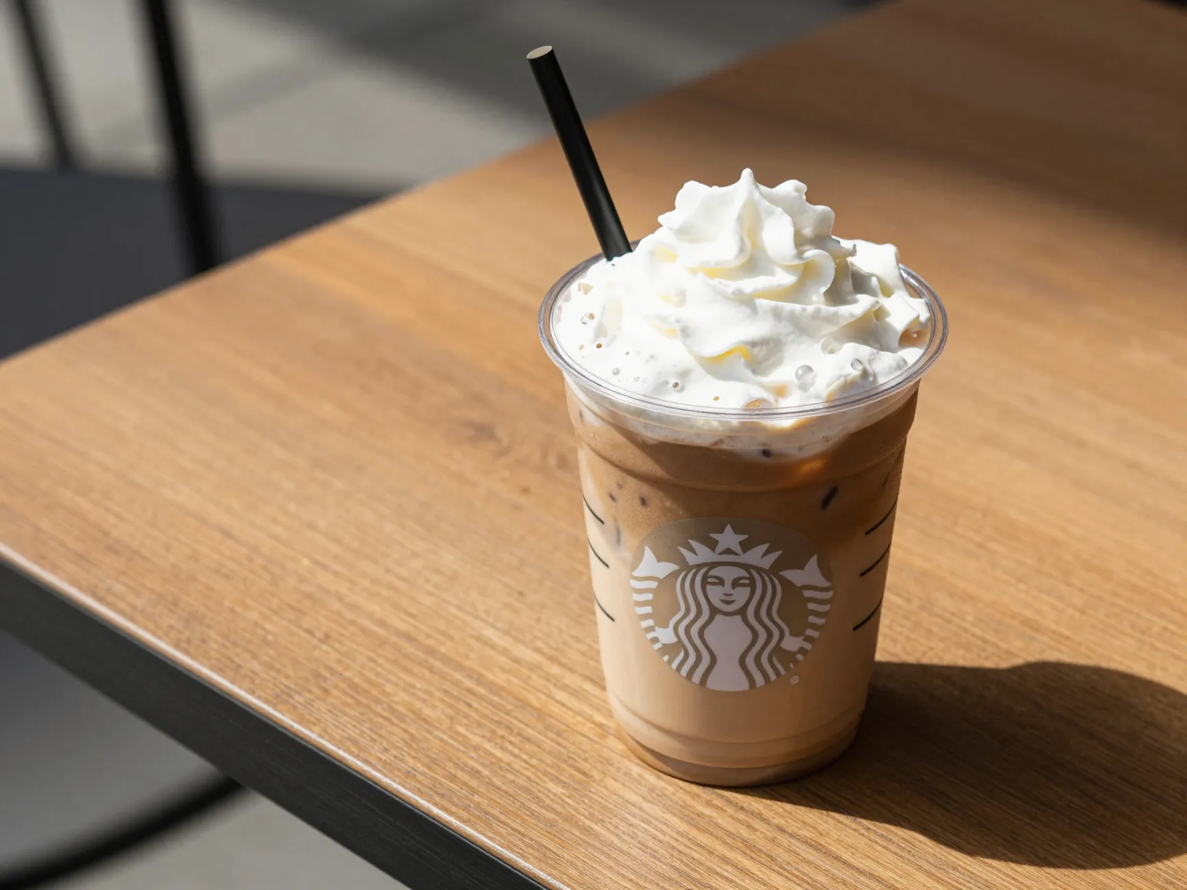 Refreshing iced peppermint mocha whipped cream sunny patio