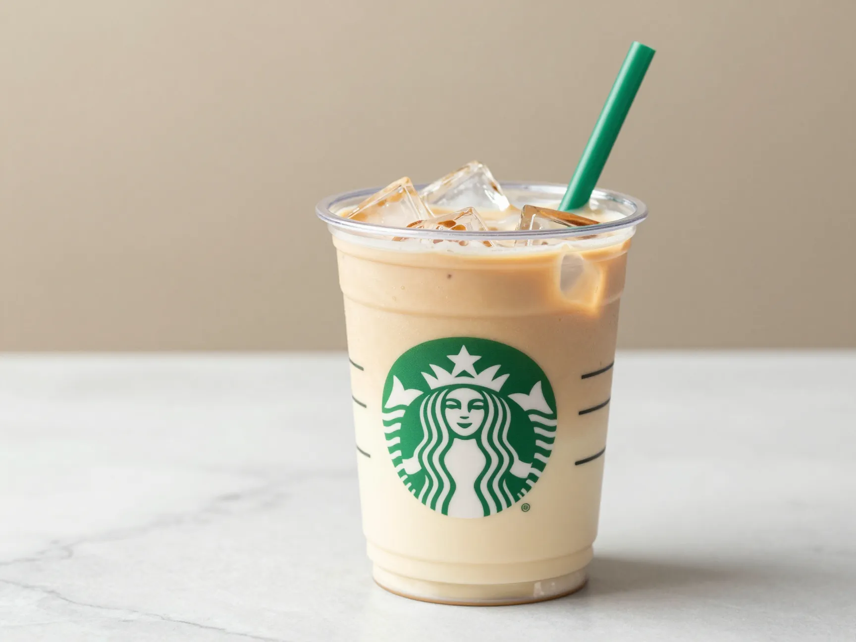 Almond milk iced vanilla blonde latte lighter color in clear plastic cup