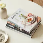 8 Stacks of Cute Coffee Table Books to Spark Conversation